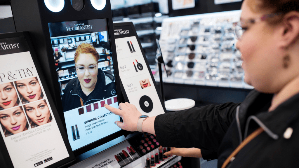 Woman tries out the Sephora Virtual Artist at the beauty retailer’s store